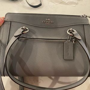 Small coach purse.